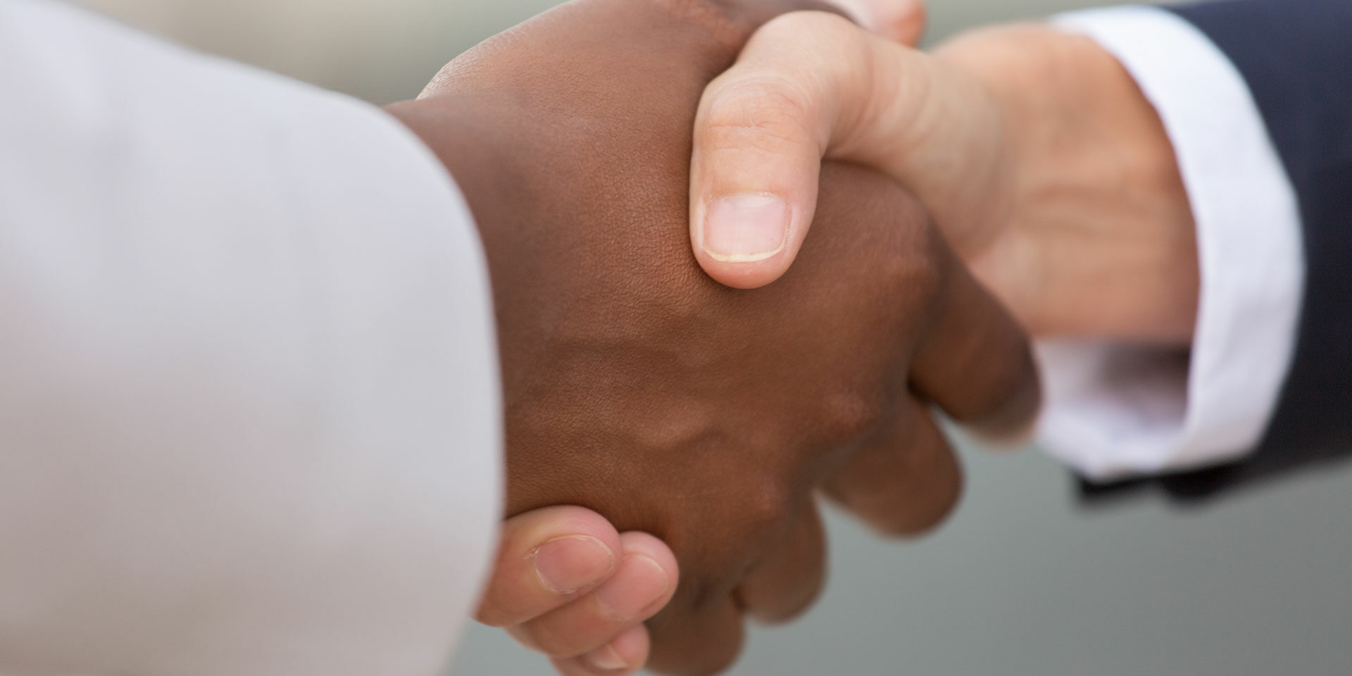 Hess Meat Machines Consultant Shaking Hands With a Client